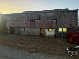 Historic barn exterior before structural renovation